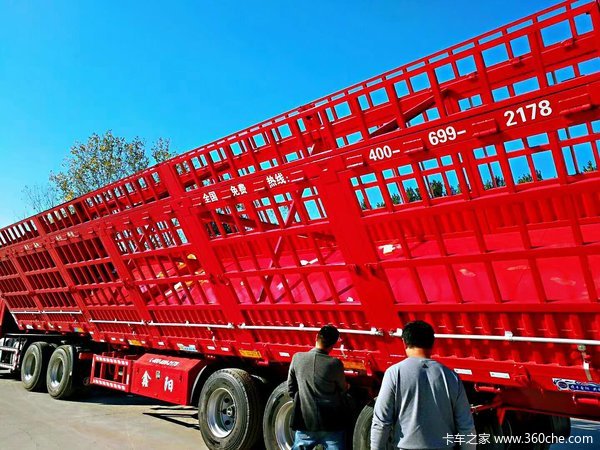 山东鑫阳专业制造重型隐形苍栏侧翻可上户拉货多自卸半挂车图片