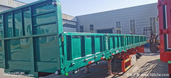 标箱侧翻自卸半挂车图片