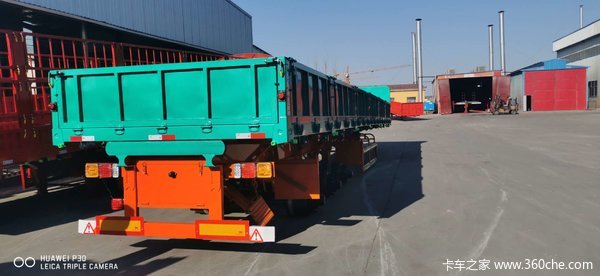 标箱侧翻自卸半挂车图片