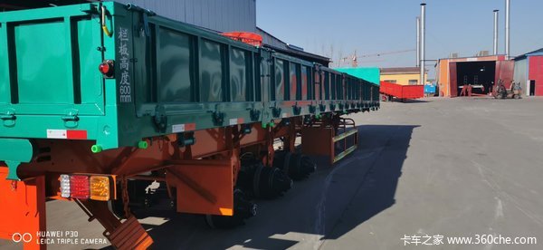 标箱侧翻自卸半挂车图片