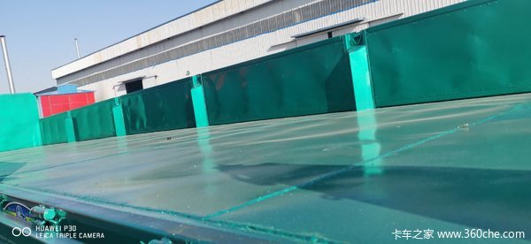 标箱侧翻自卸半挂车图片