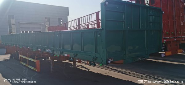 标箱侧翻自卸半挂车图片