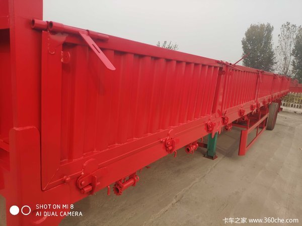 标箱侧翻自卸半挂车图片