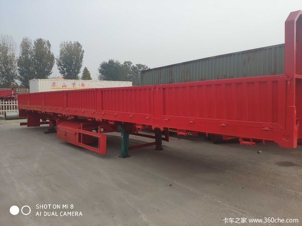 标箱侧翻自卸半挂车图片